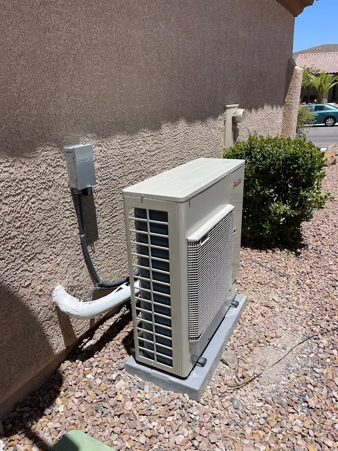 Residential air conditioning condenser unit in Town and Country